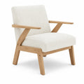 Silla tapizada en bouclé con estructura de madera